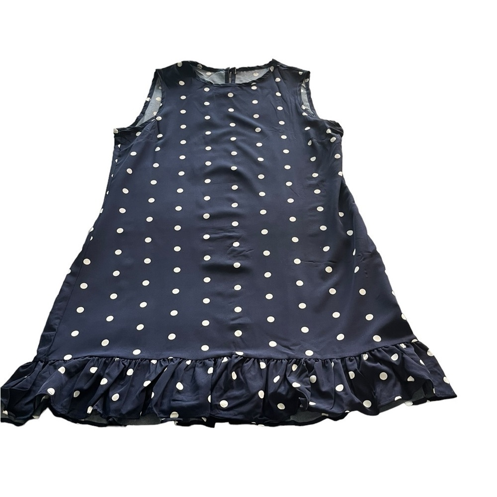 Navy and white sleeveless polkadot dress with ruffle bottom - Picture 4 of 7